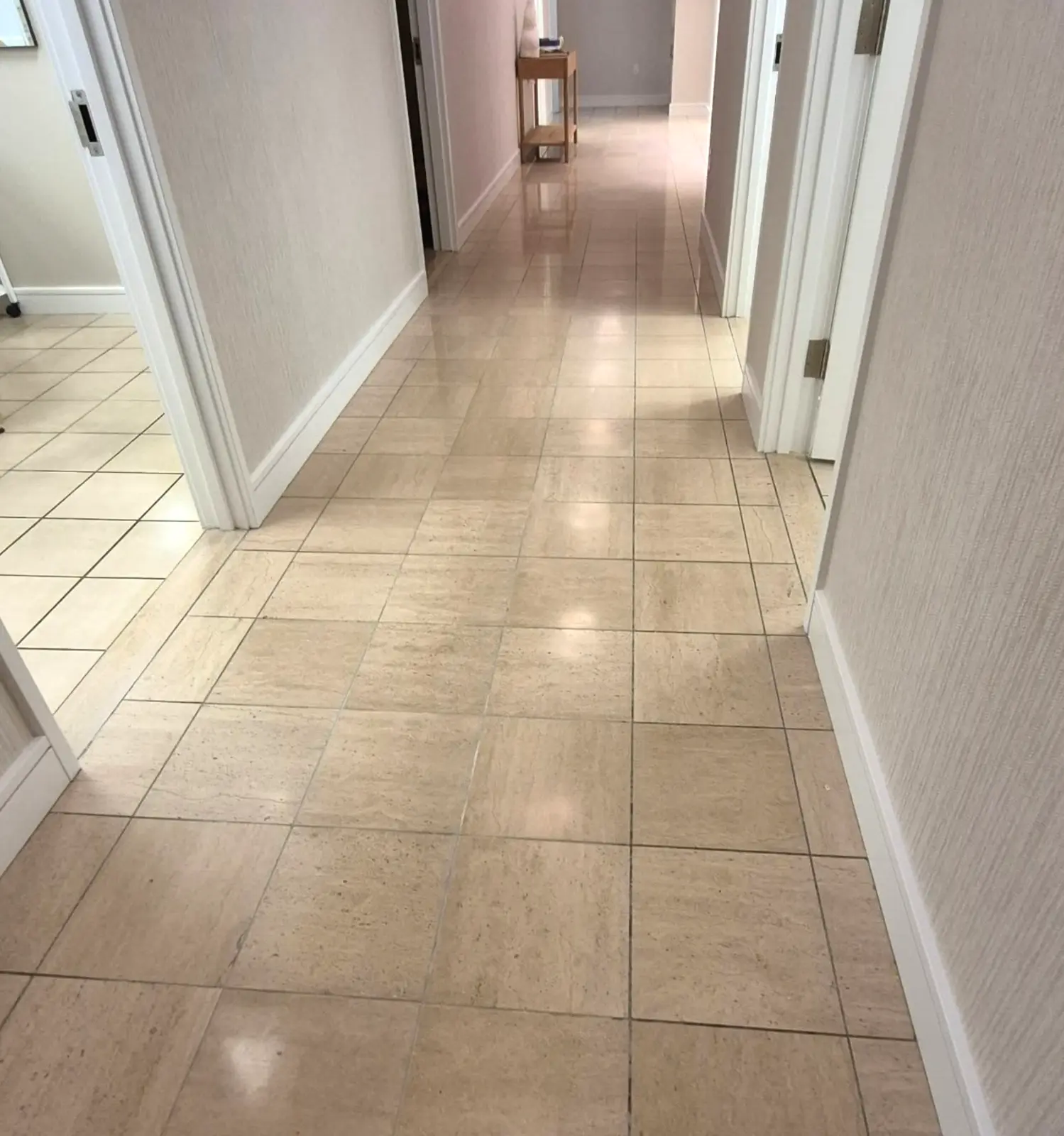 Cleaned tile floor in a hallway